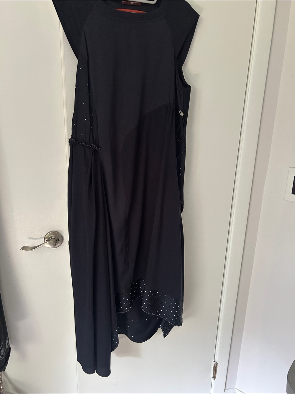 Elegant Black High-Low Sleeveless Dress with Subtle Stud Detail